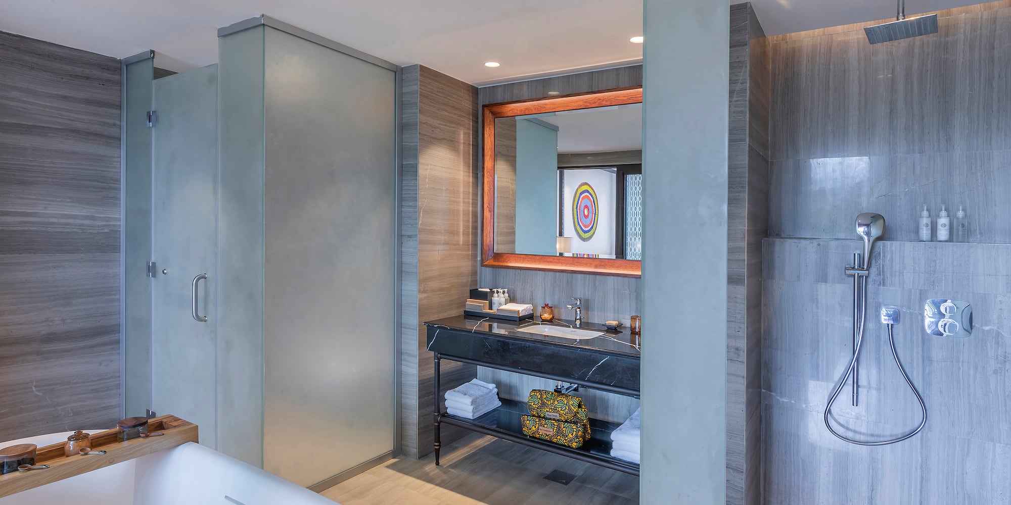 a bathroom with a tub and sink