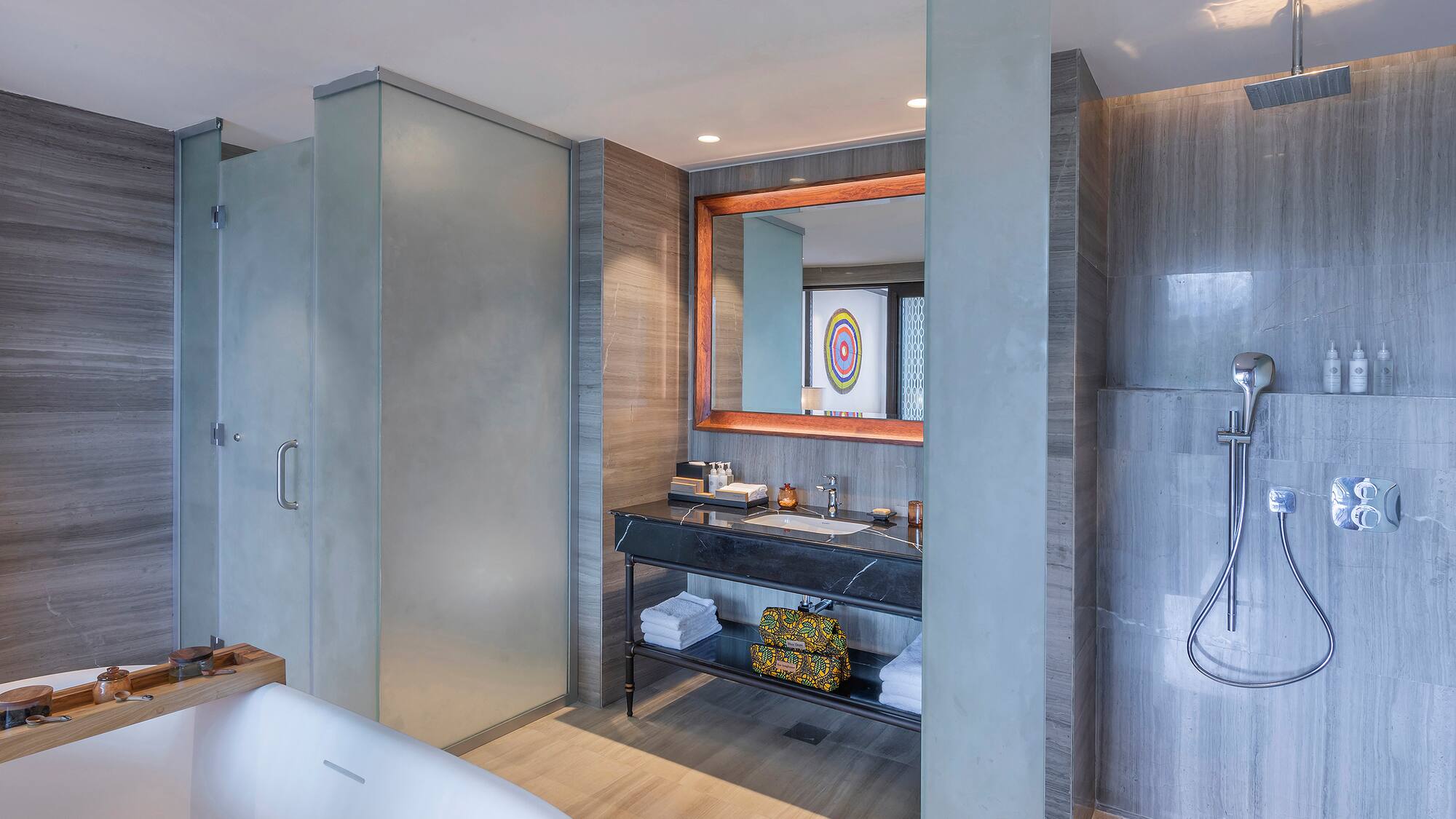 a bathroom with a tub and sink