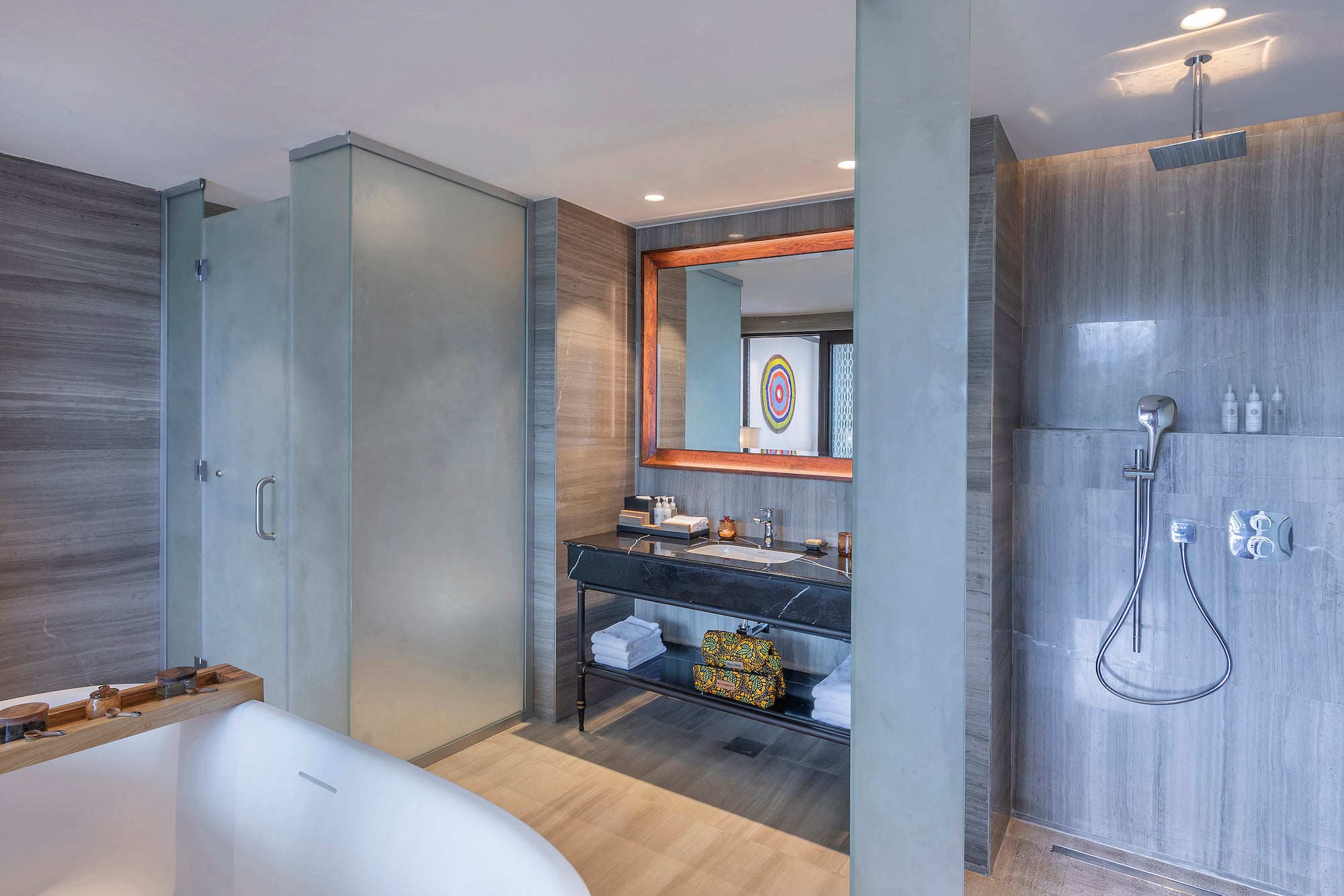 a bathroom with a tub and sink