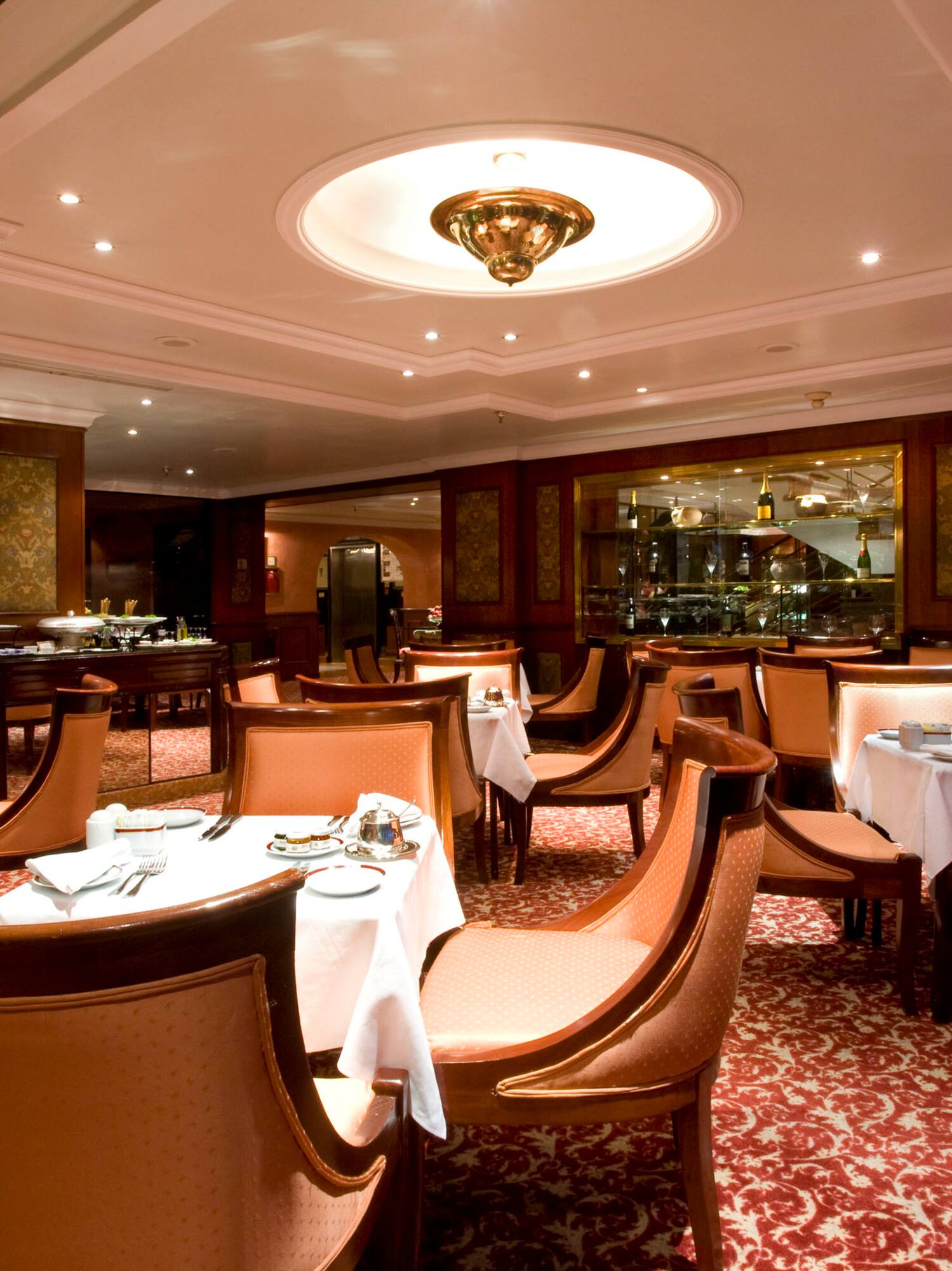 a restaurant with tables and chairs