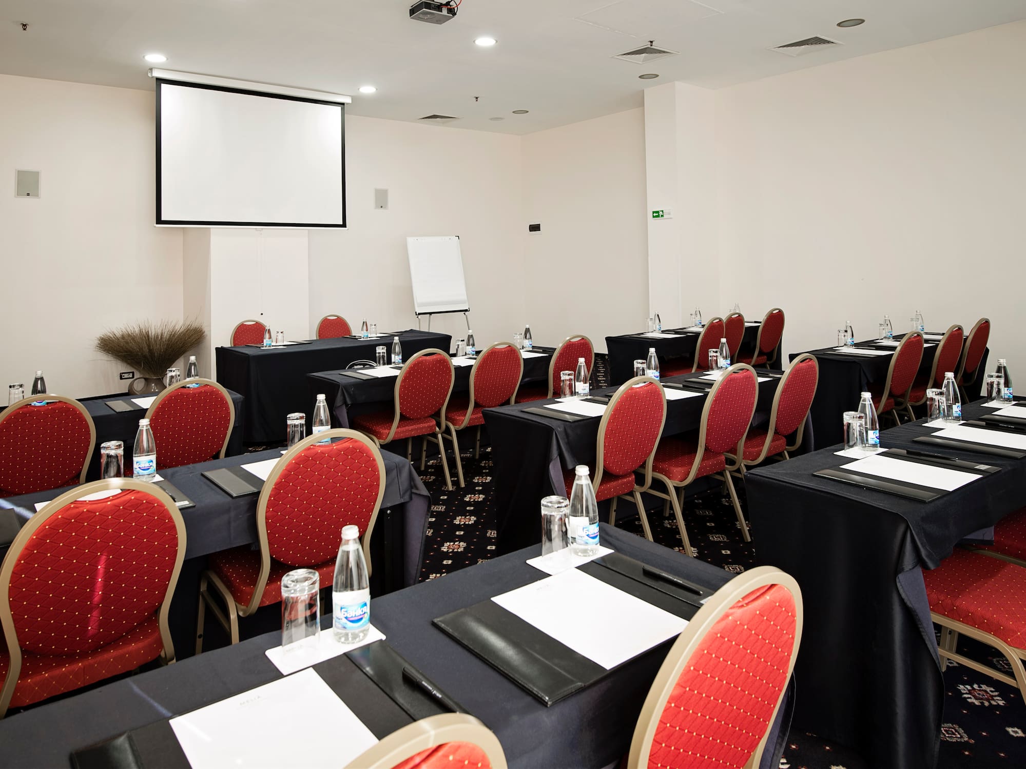 a room with tables and chairs