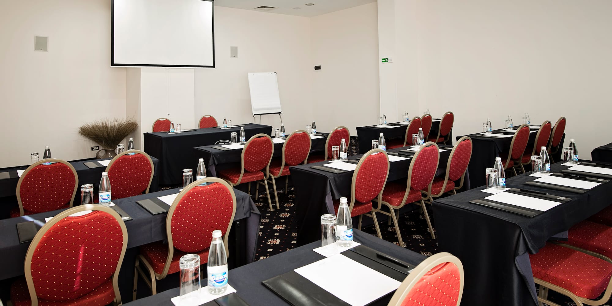 a room with tables and chairs