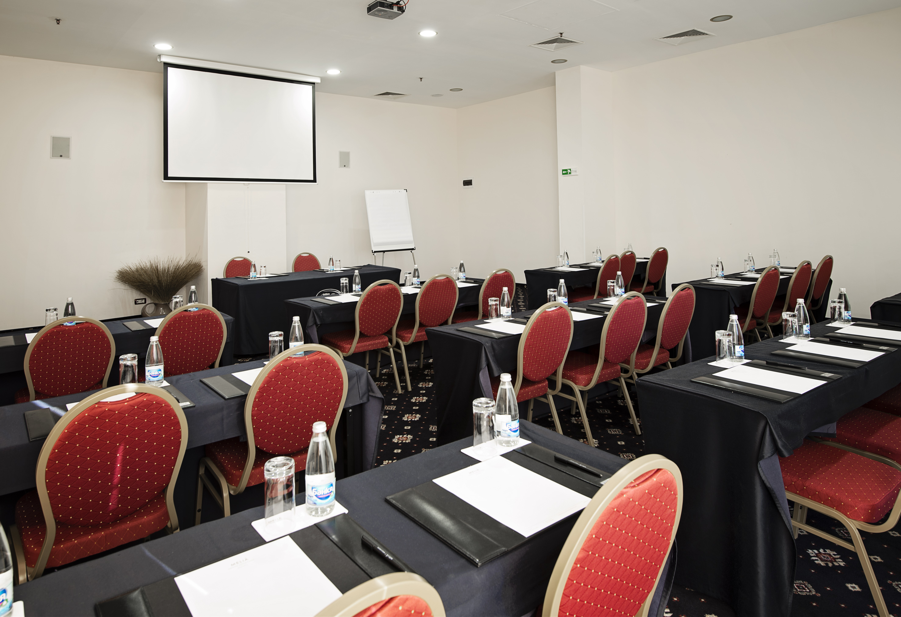 a room with tables and chairs
