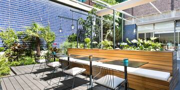 a table and chairs on a patio