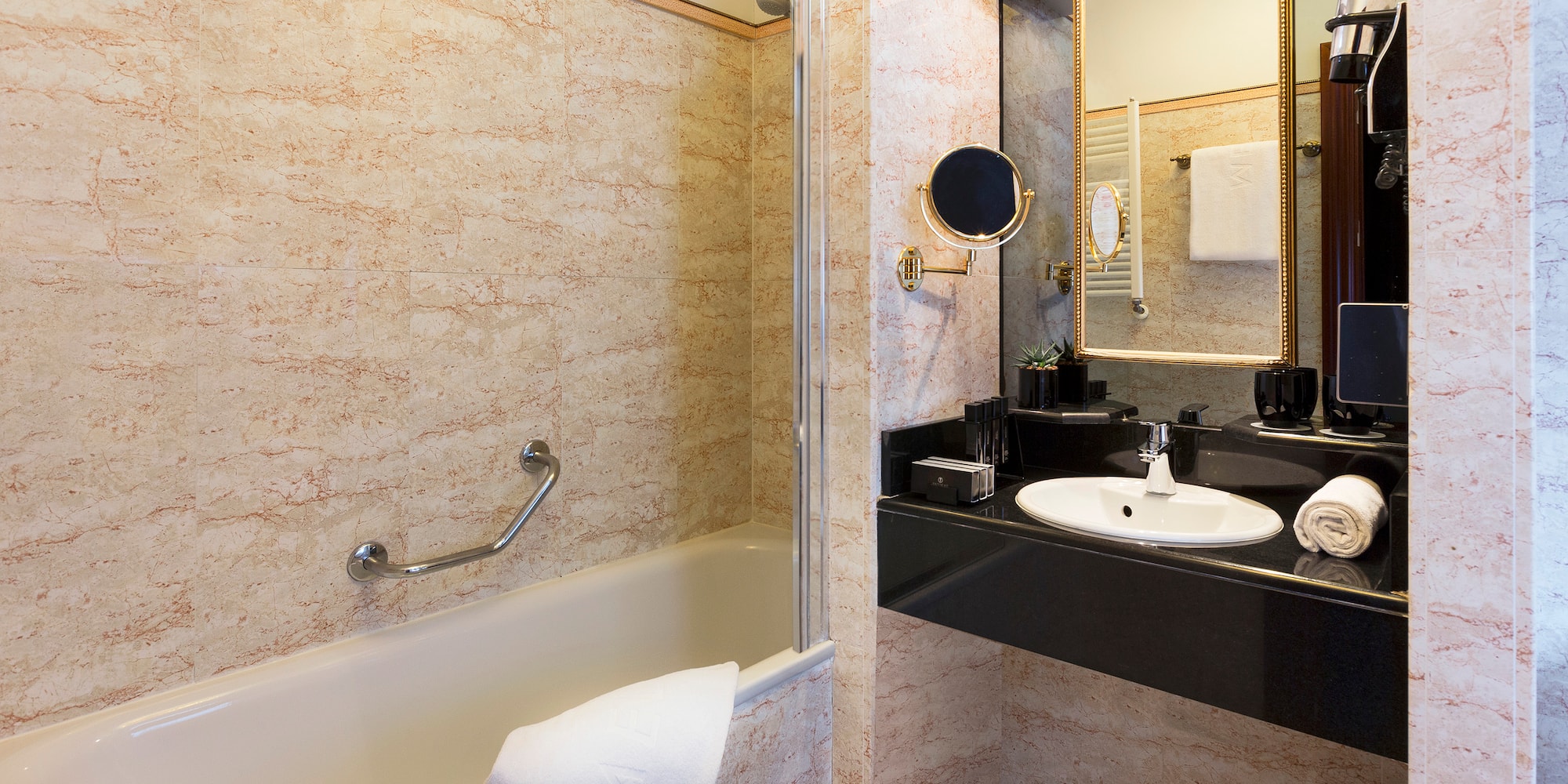 a bathroom with a sink and bathtub