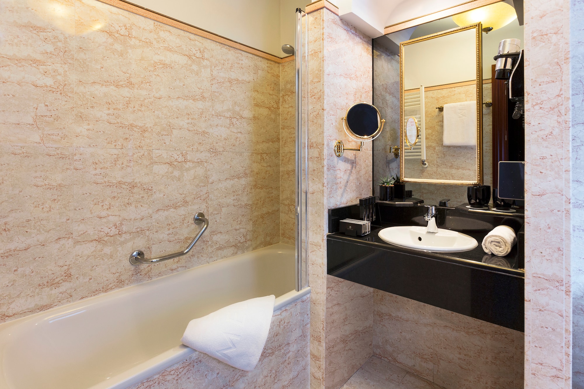 a bathroom with a sink and bathtub