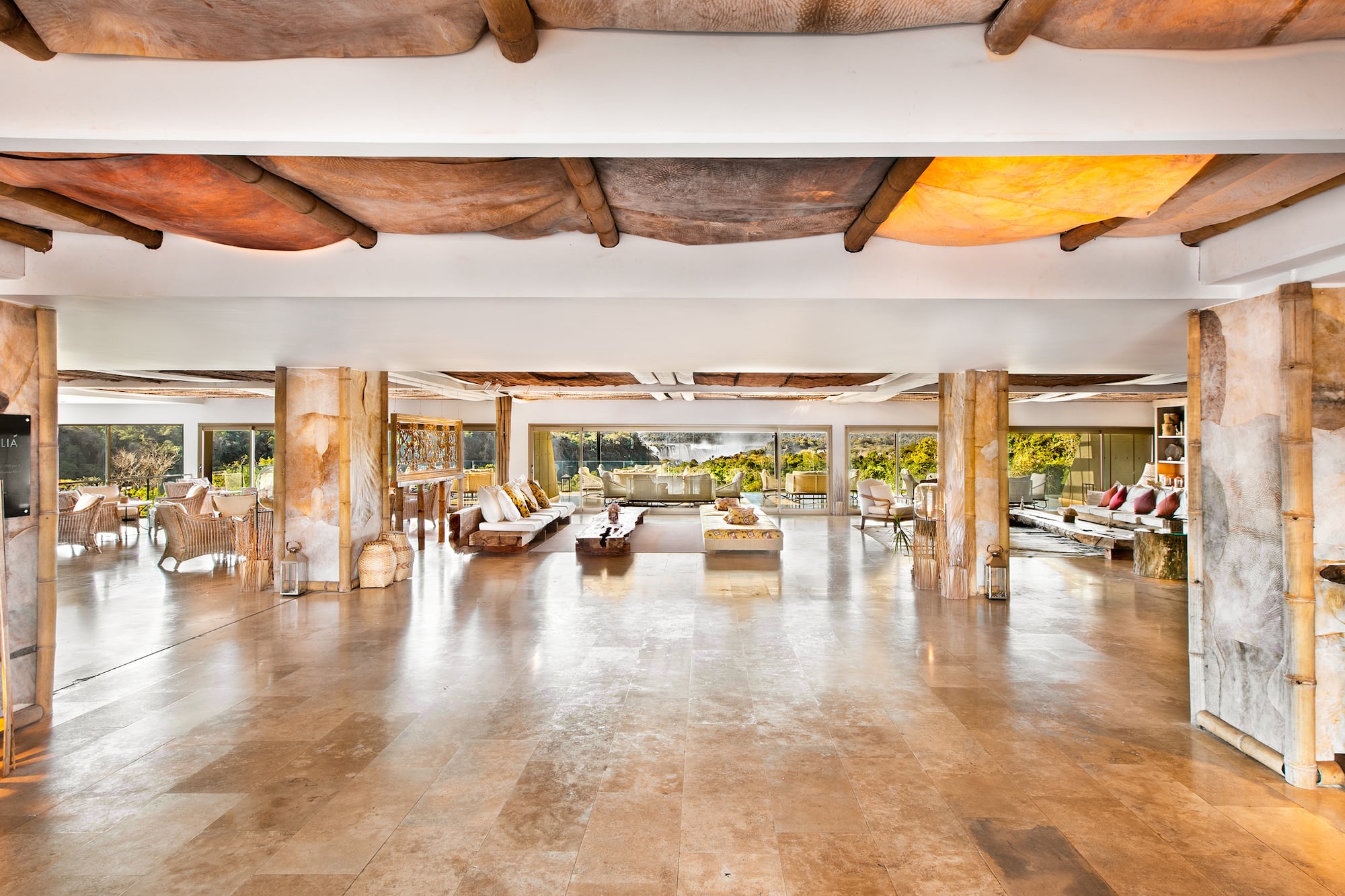 Gran Meliá Iguazu luxury hotel lobby overlooking Iguazu Falls.