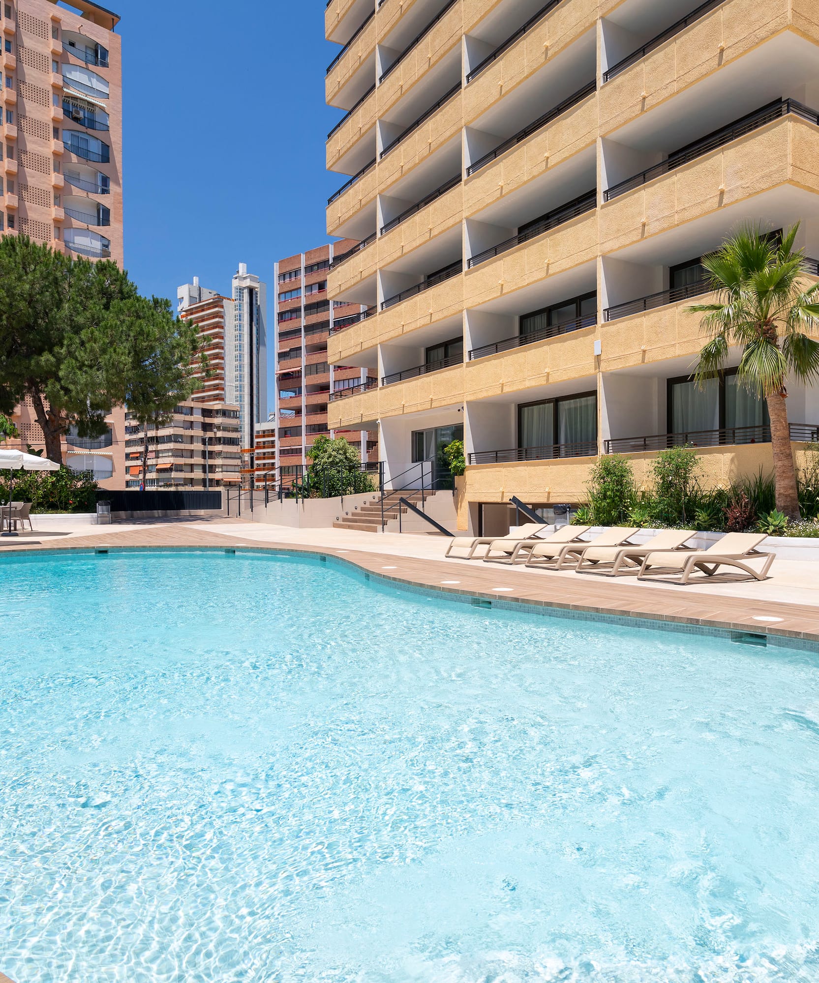 a pool in front of a building