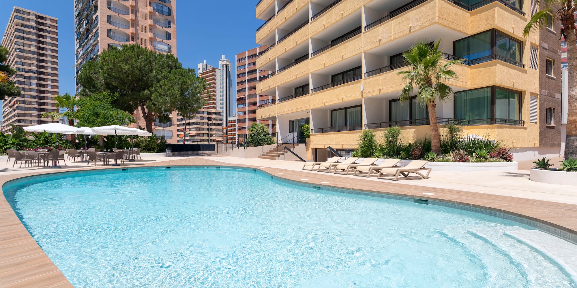 a pool in front of a building