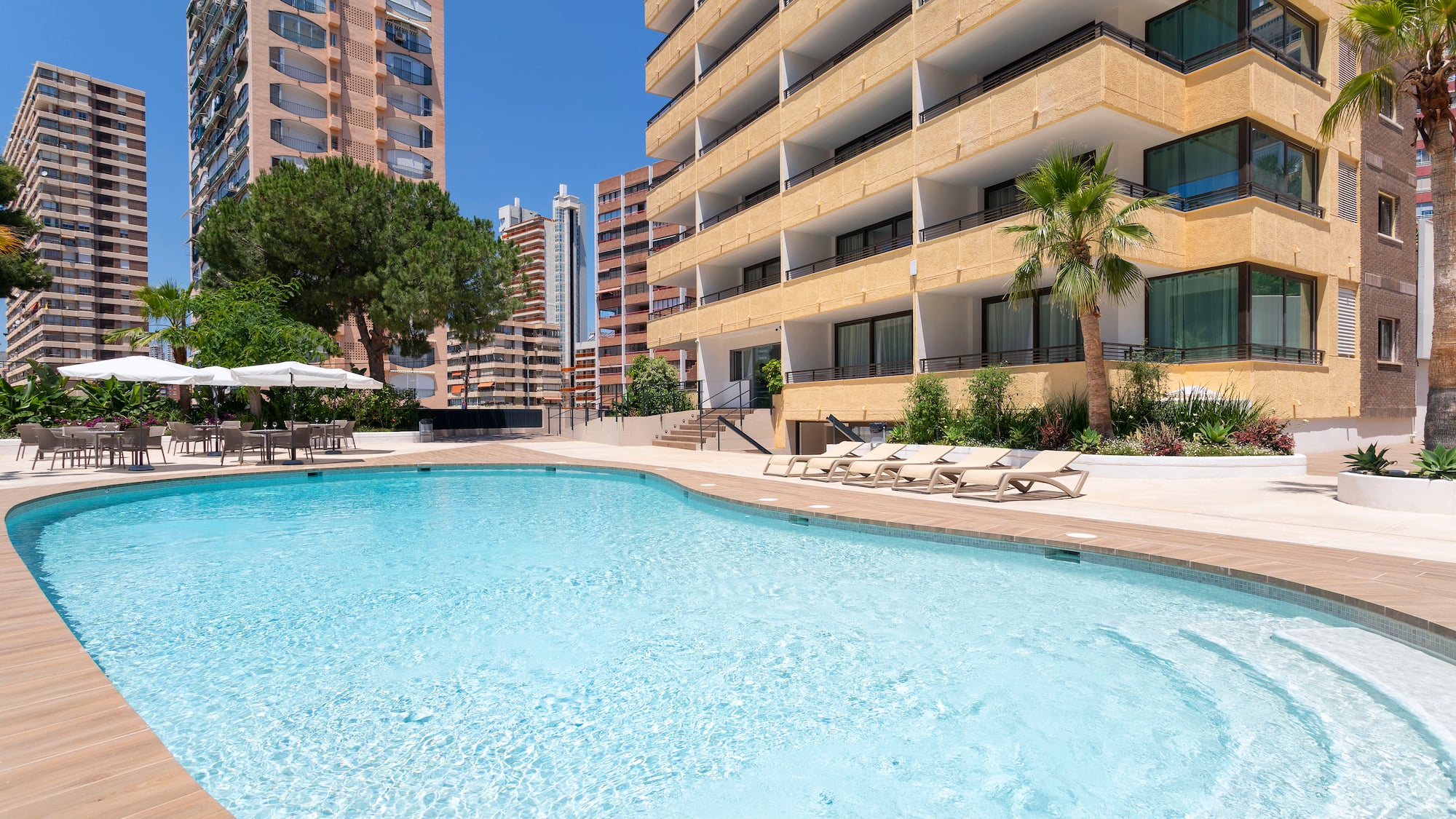 a pool in front of a building