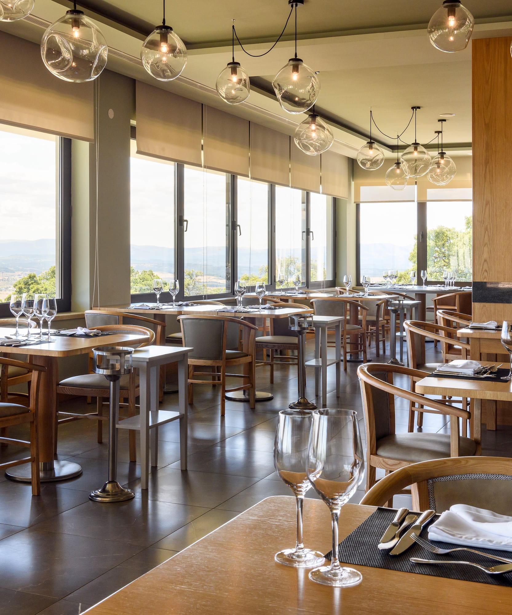 a restaurant with tables and chairs