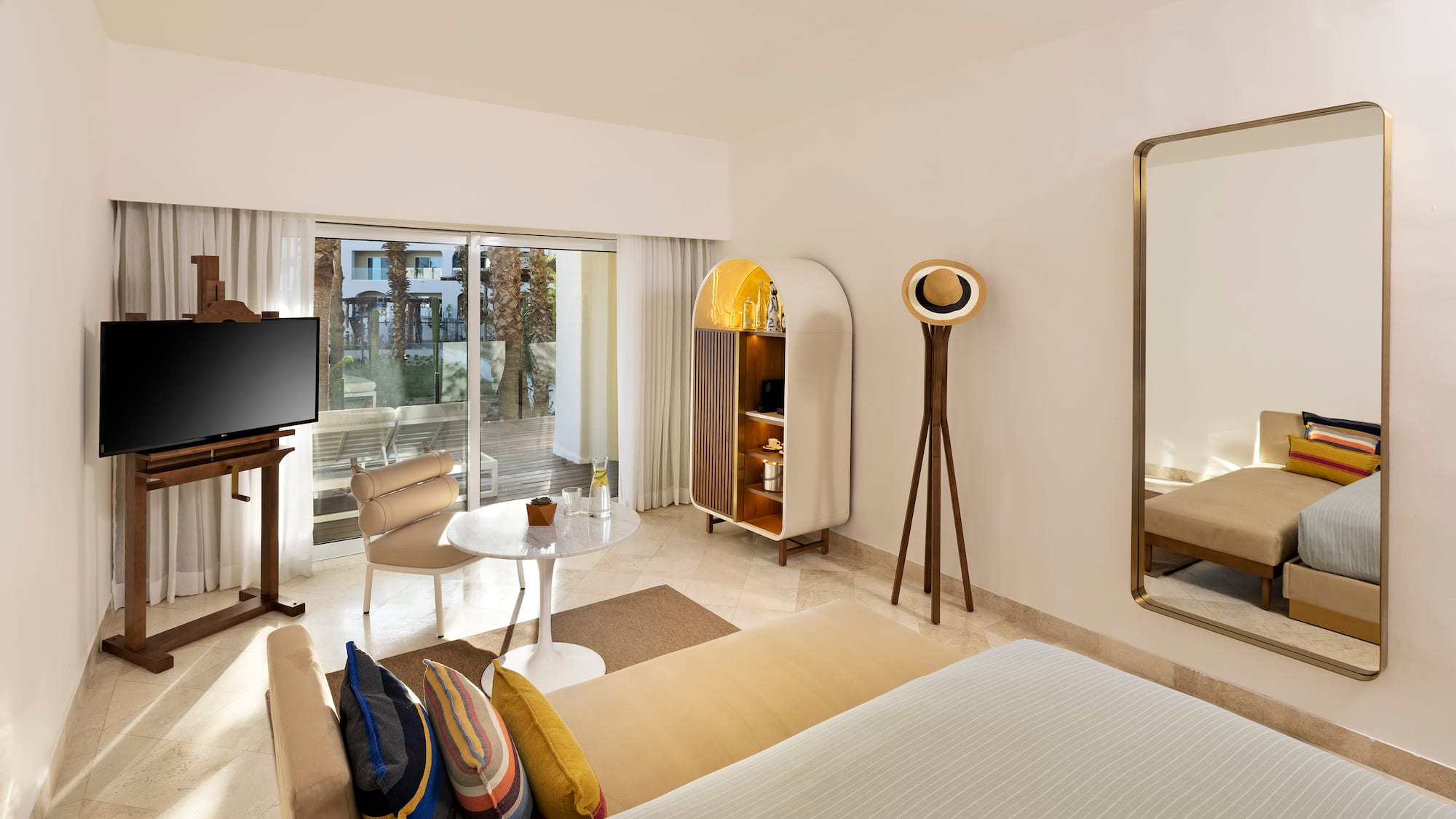 a room with a television and a bed