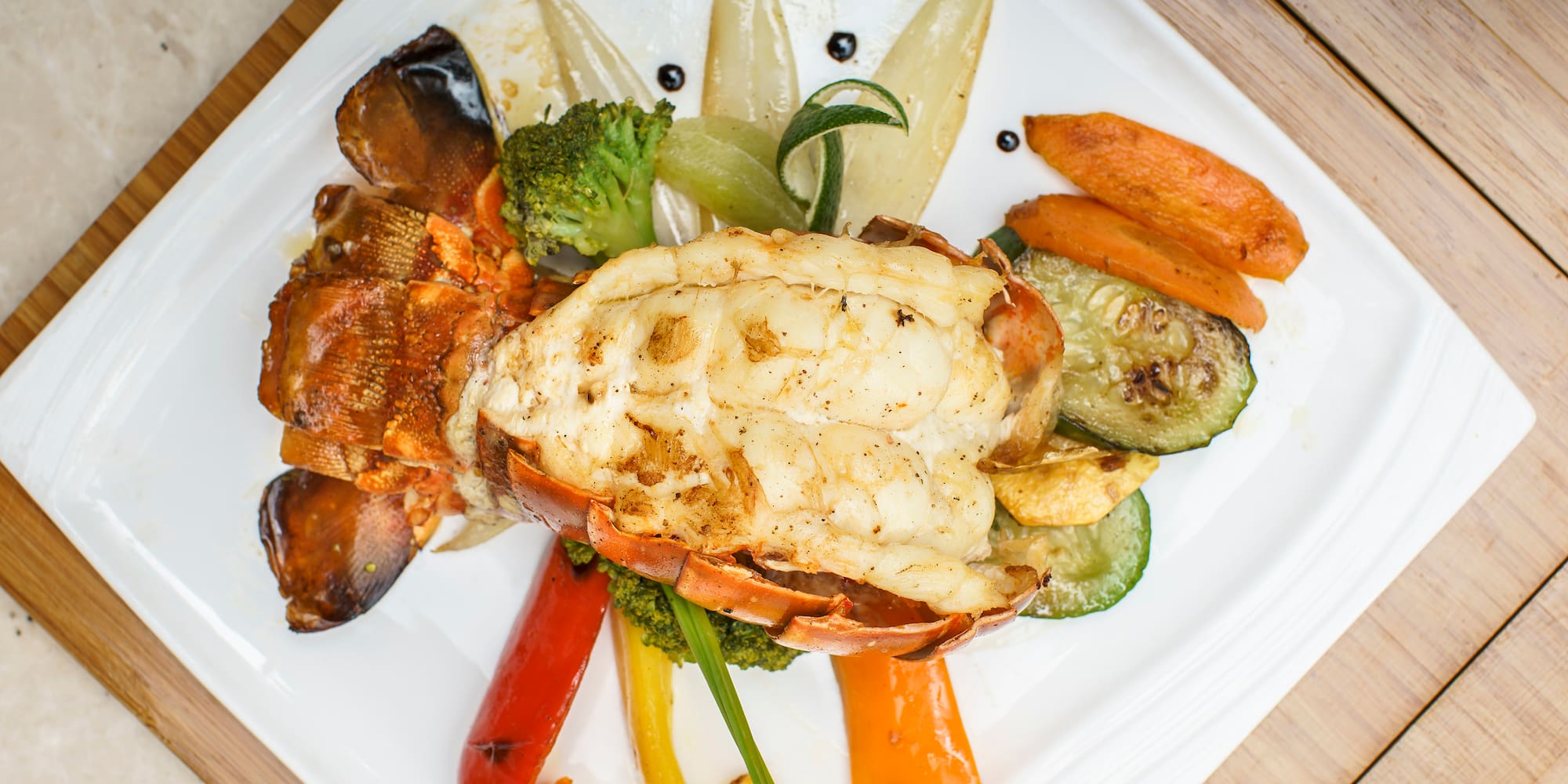 a plate of food on a wood surface