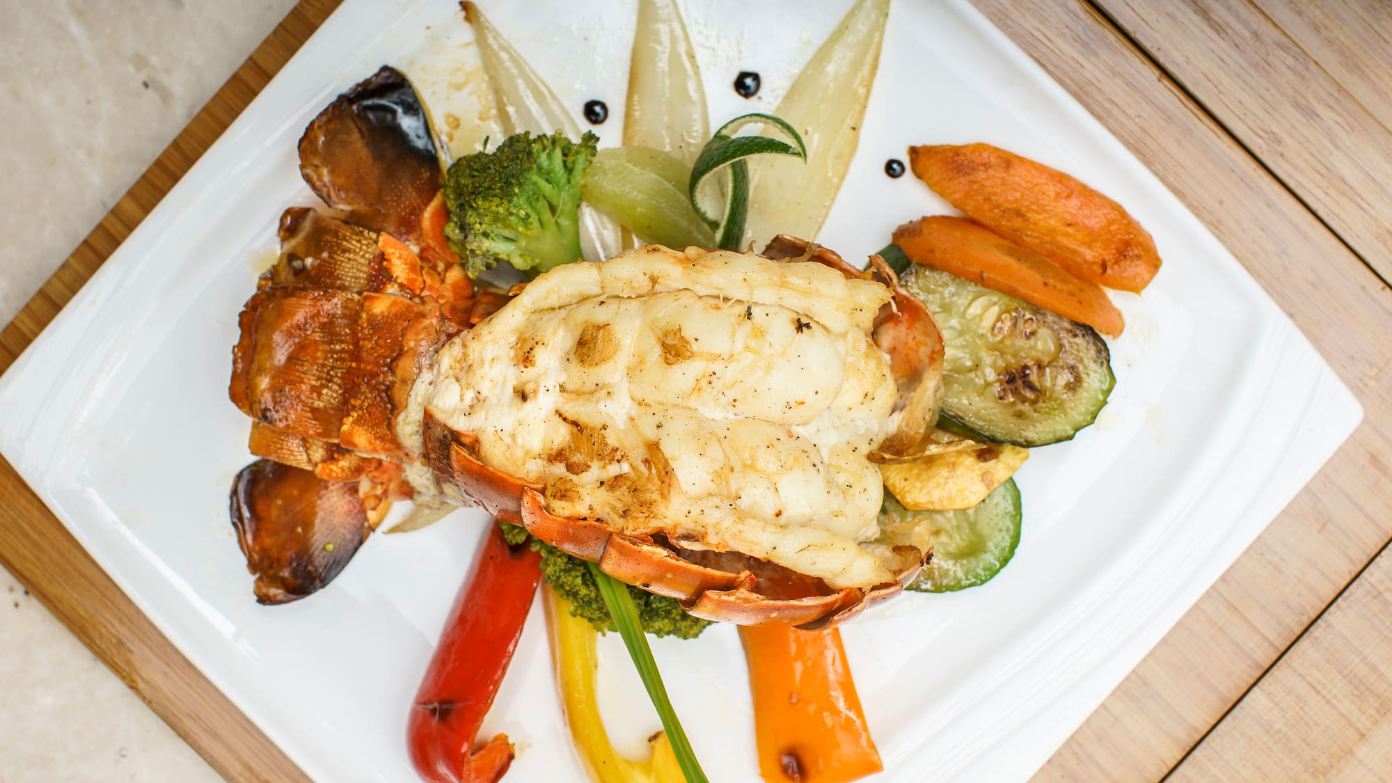 a plate of food on a wood surface