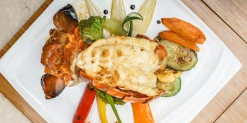 a plate of food on a wood surface