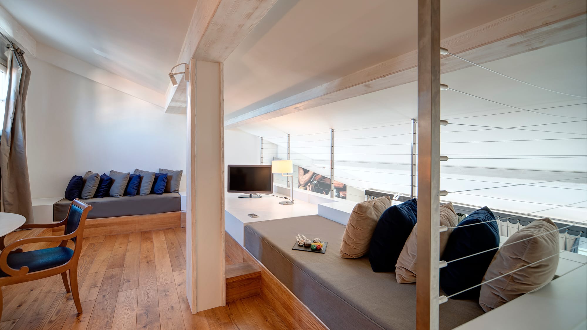 a room with a couch and a television