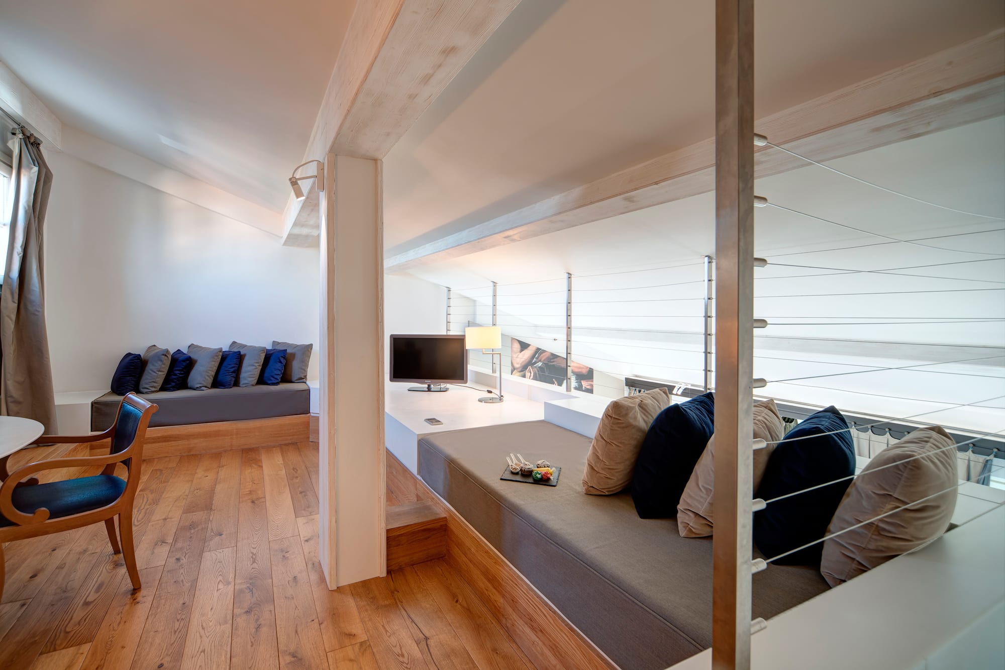 a room with a couch and a television