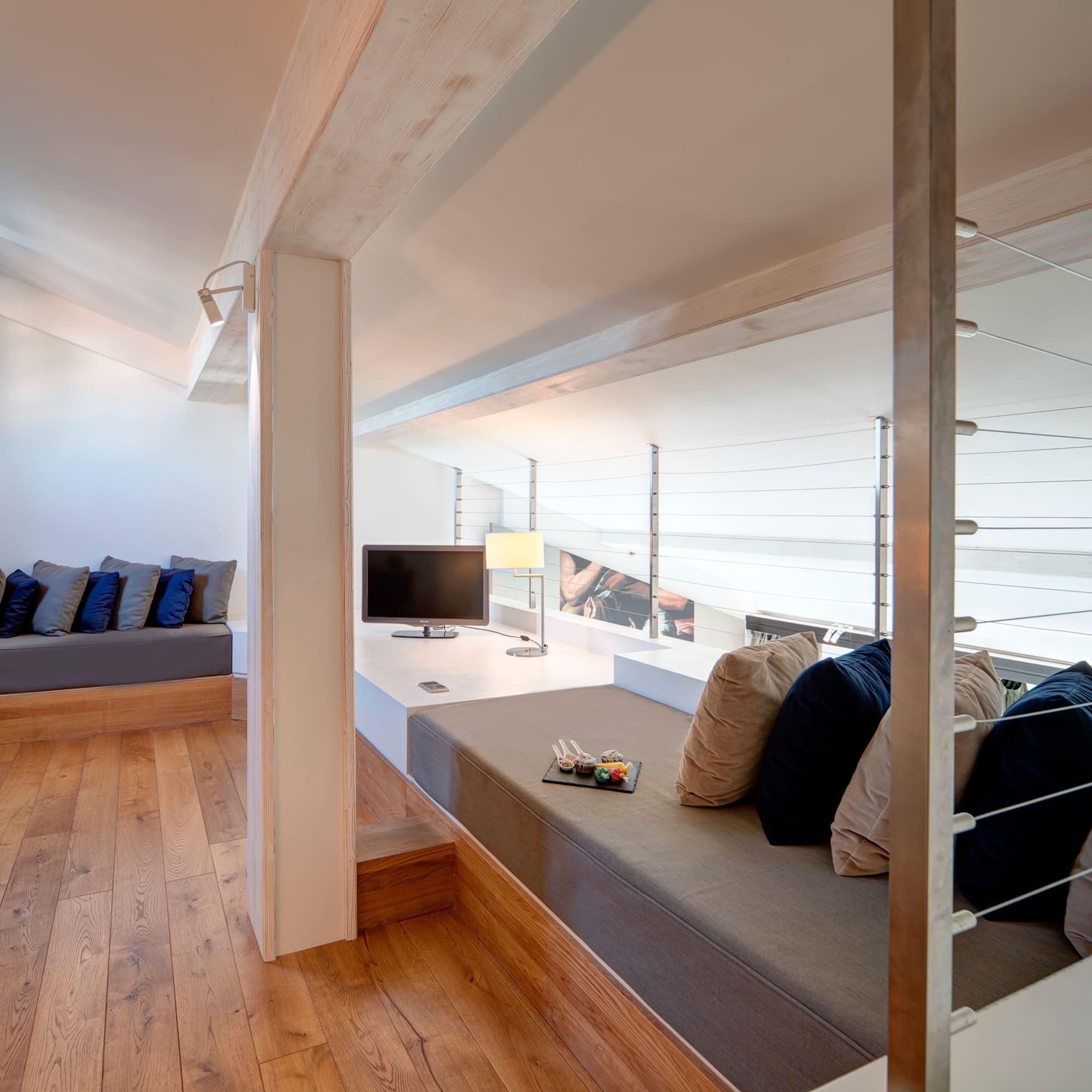 a room with a couch and a television