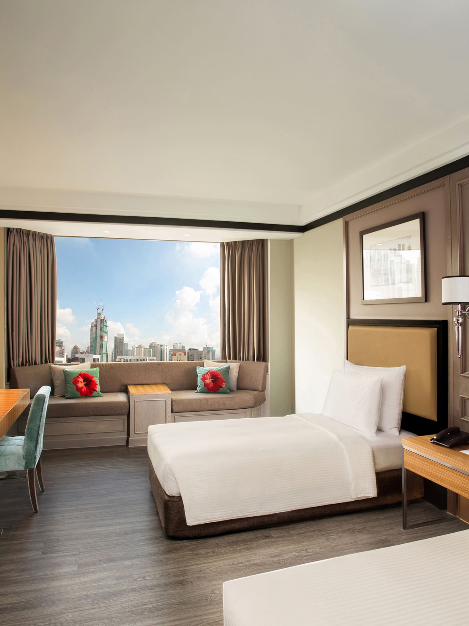 a room with two beds and a desk