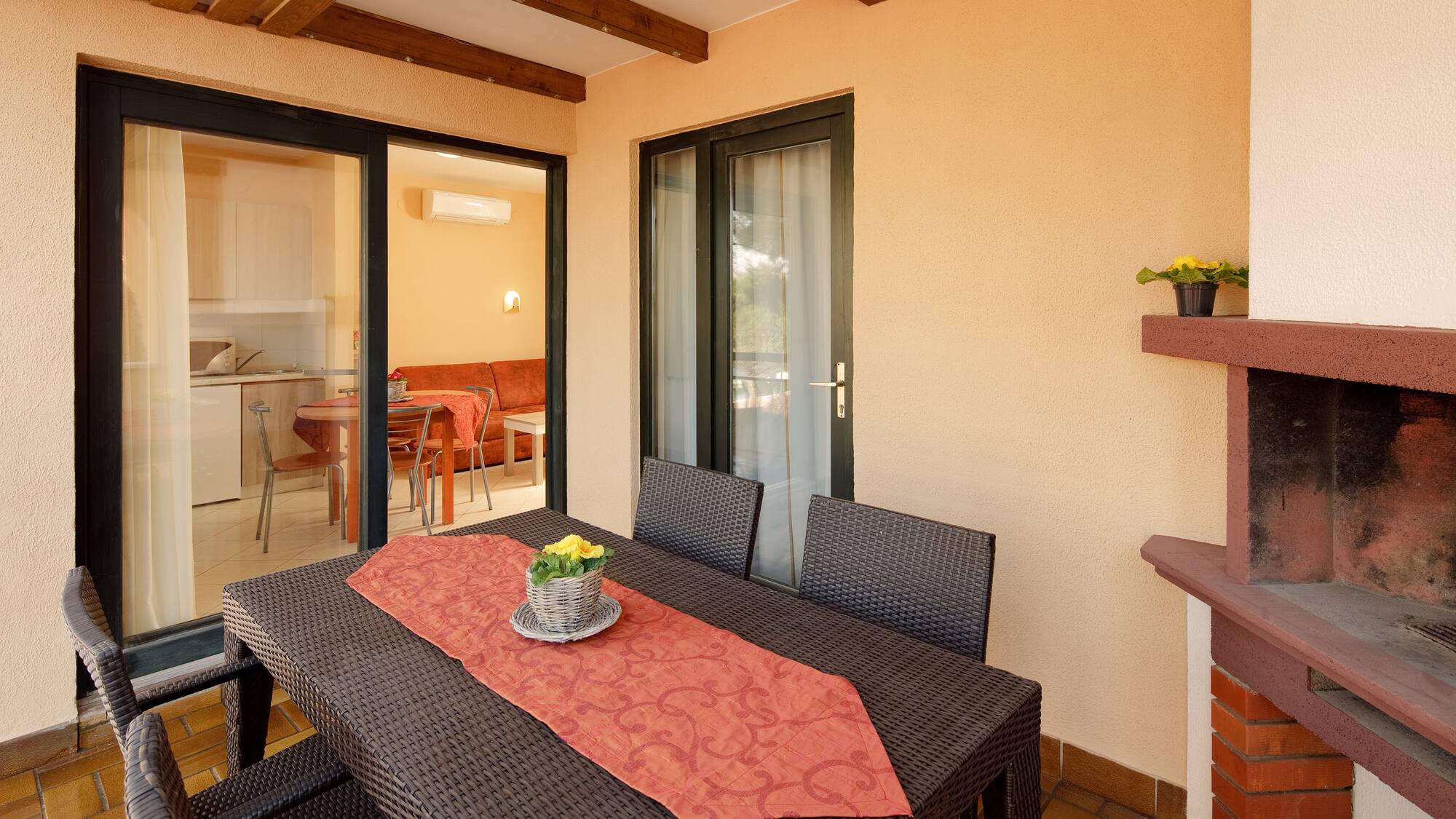 a table and chairs on a patio