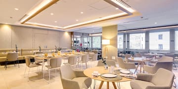 a room with tables and chairs