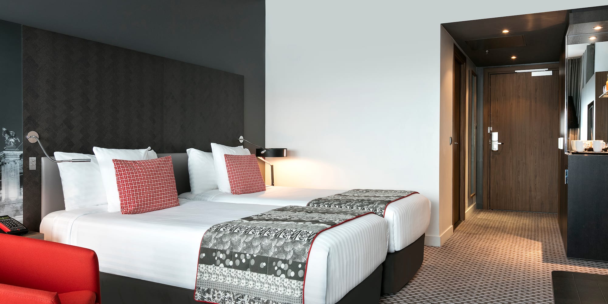 a hotel room with two beds