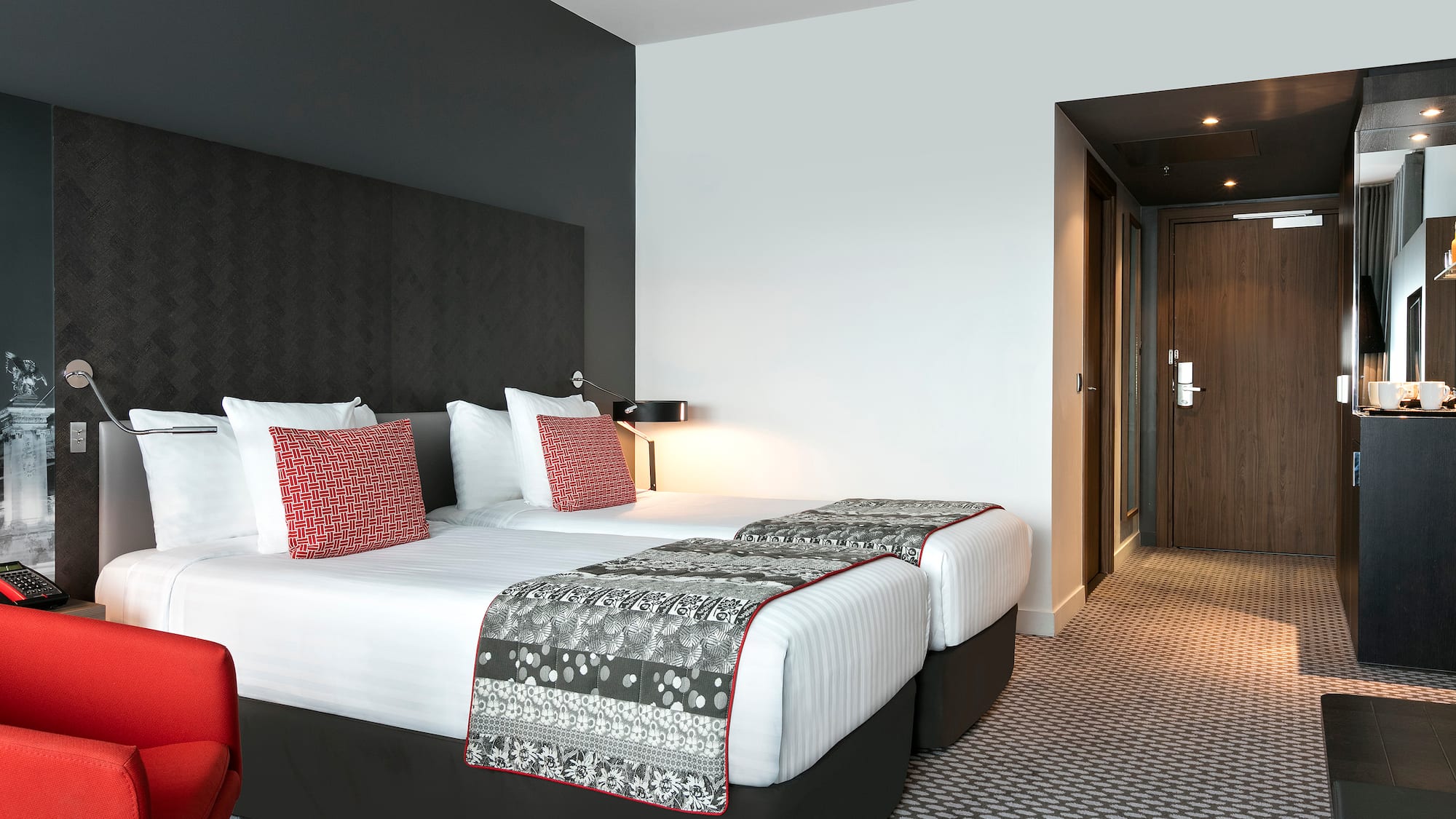 a hotel room with two beds