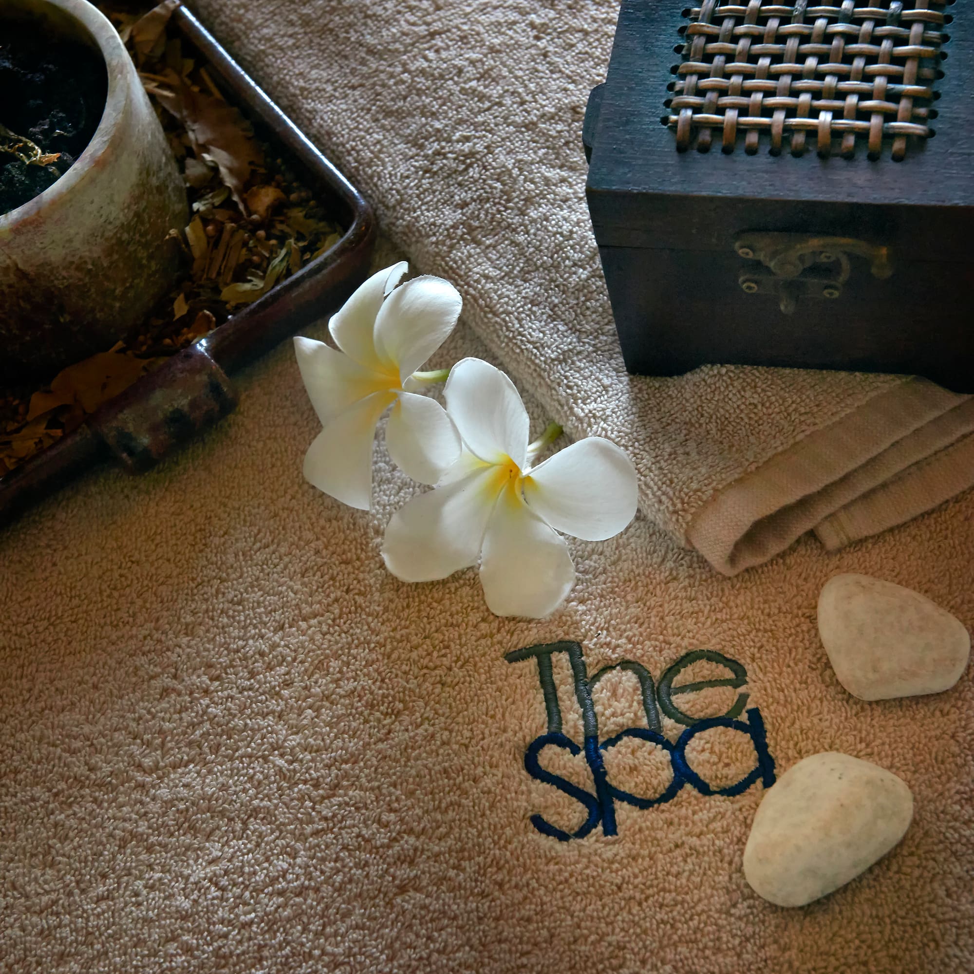 a white flowers on a towel