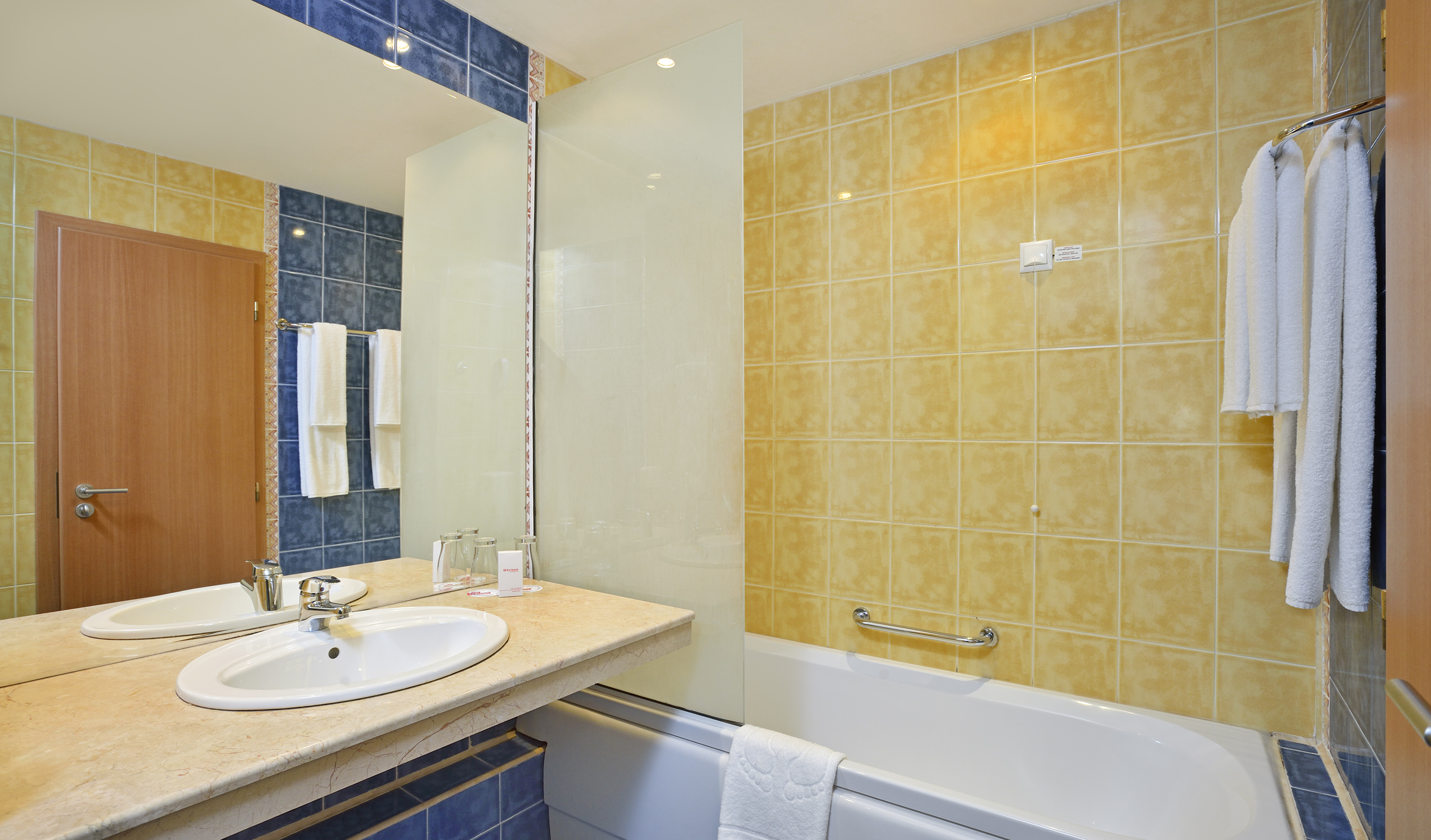 a bathroom with a sink and bathtub