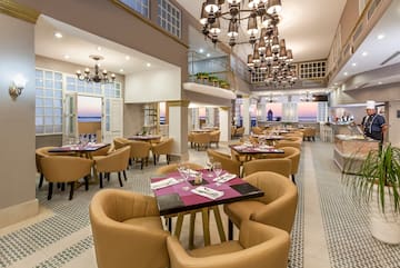 a room with tables and chairs