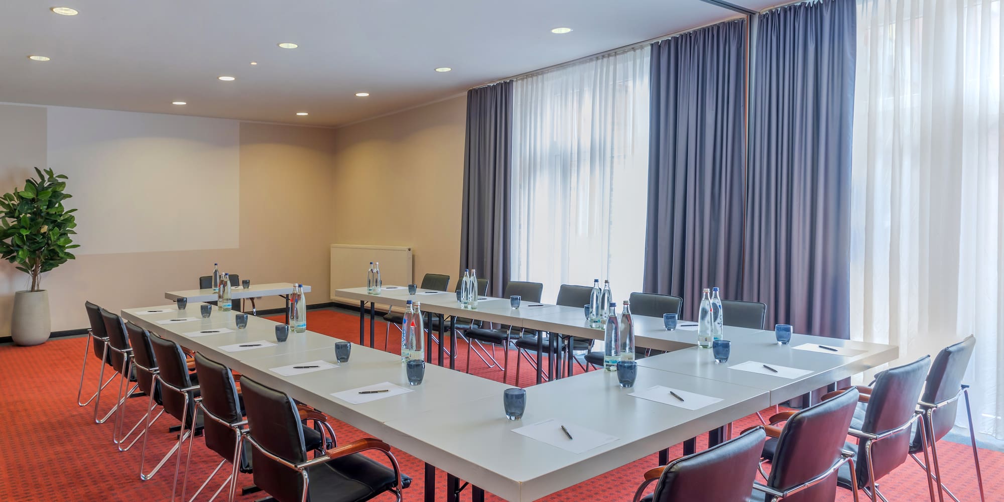 a room with tables and chairs