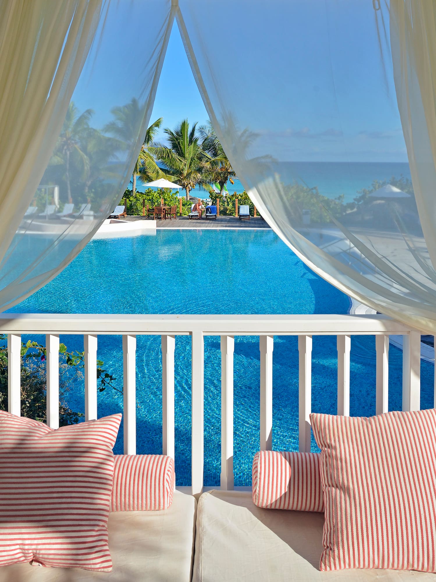 a pool with a pool in the background