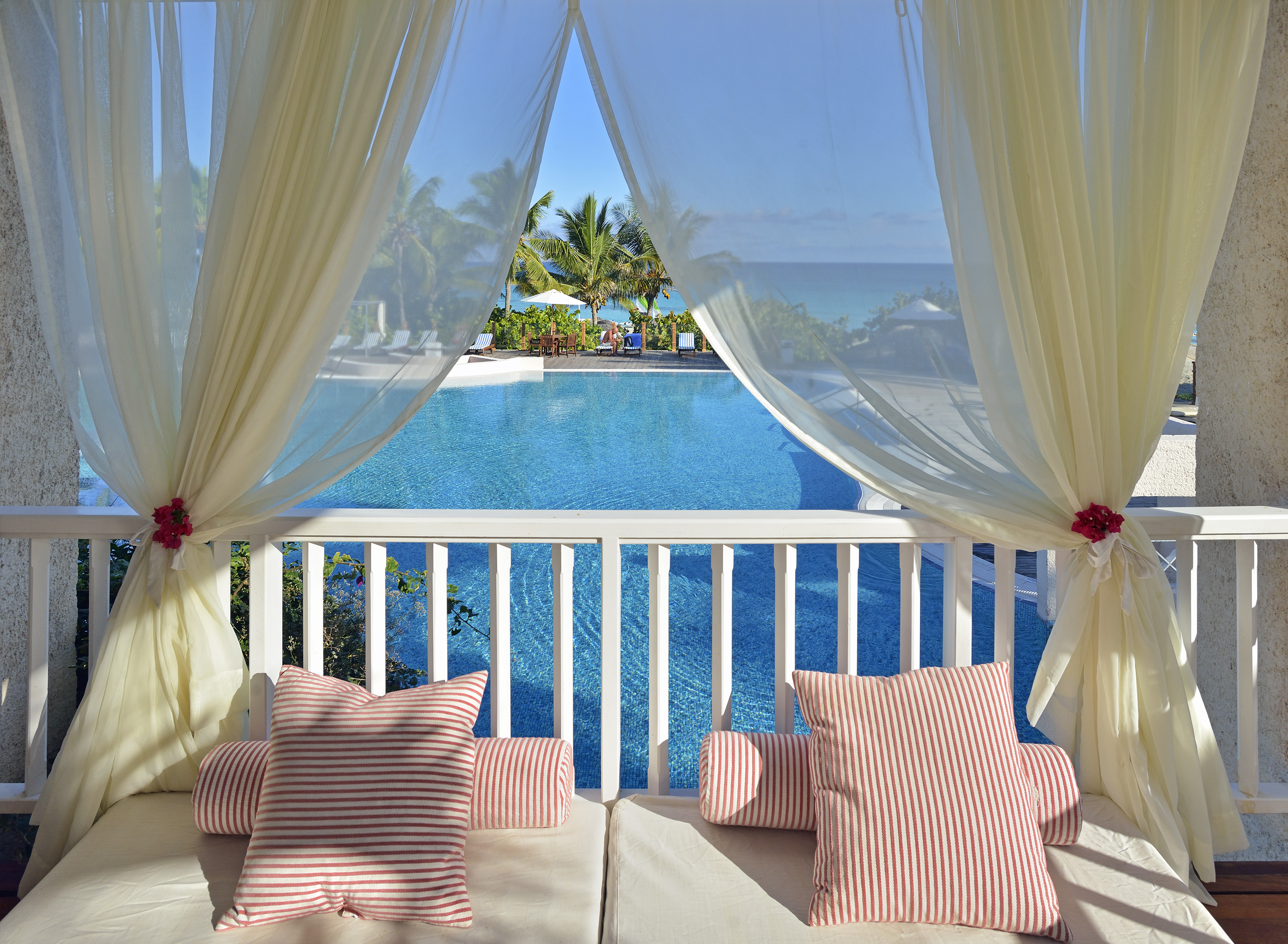 a pool with a pool in the background