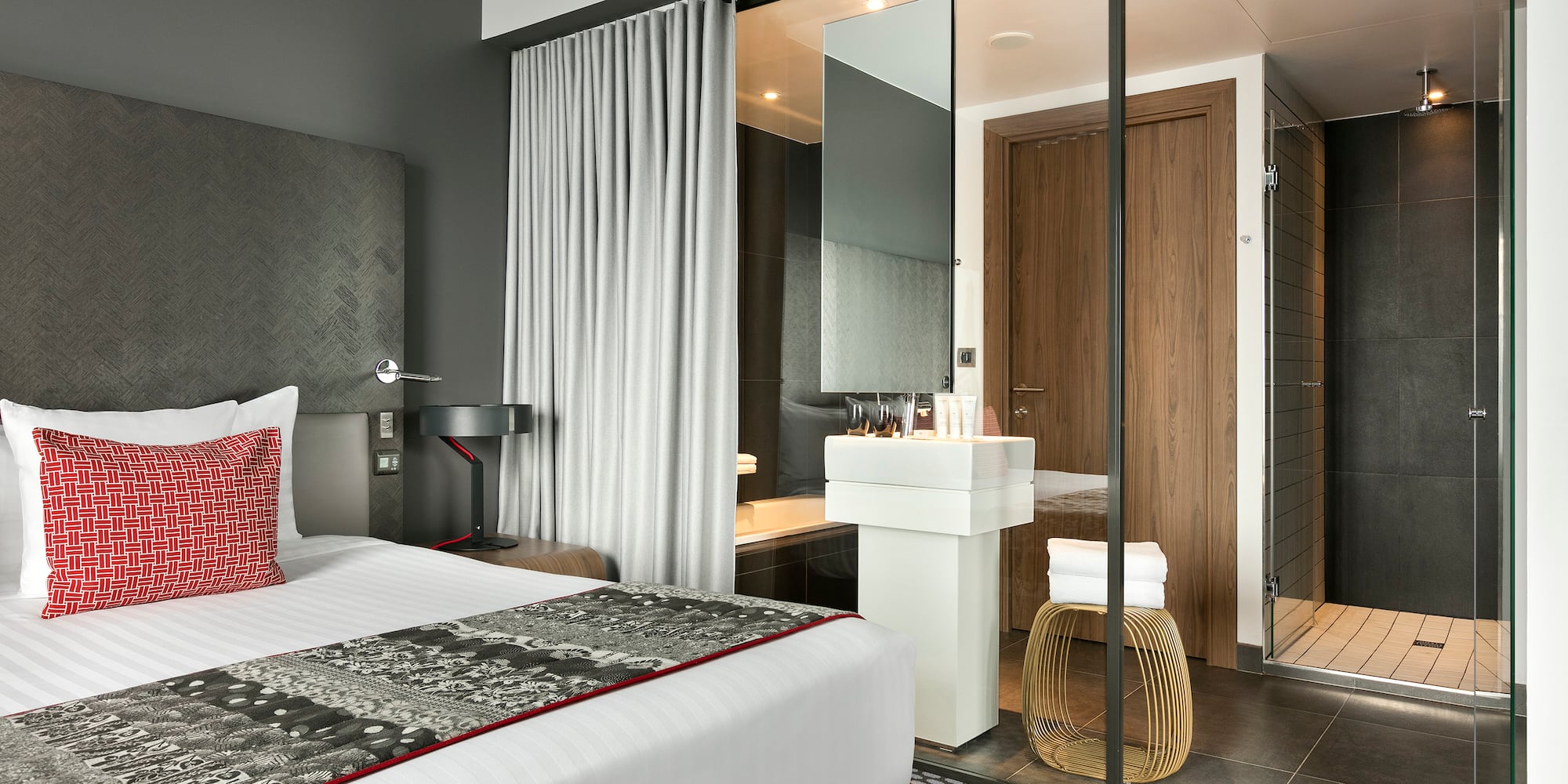 a bedroom with a glass door