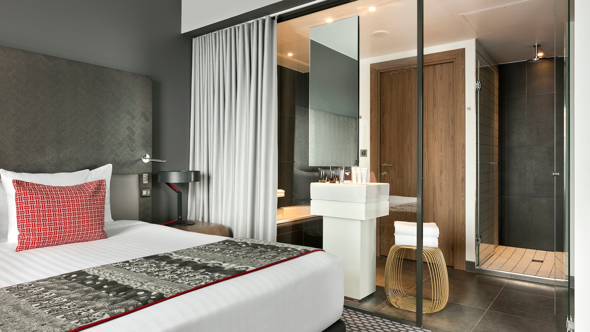 a bedroom with a glass door