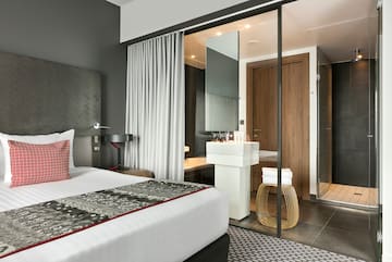 a bedroom with a glass door