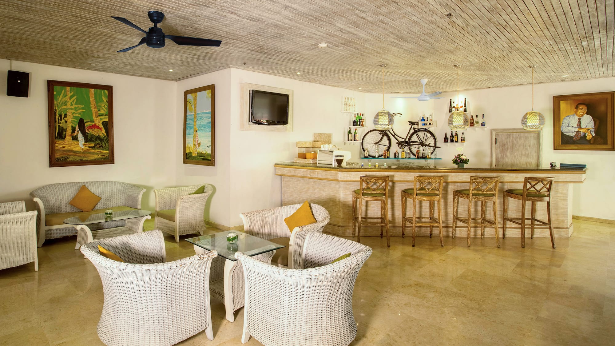 a room with a bar and chairs