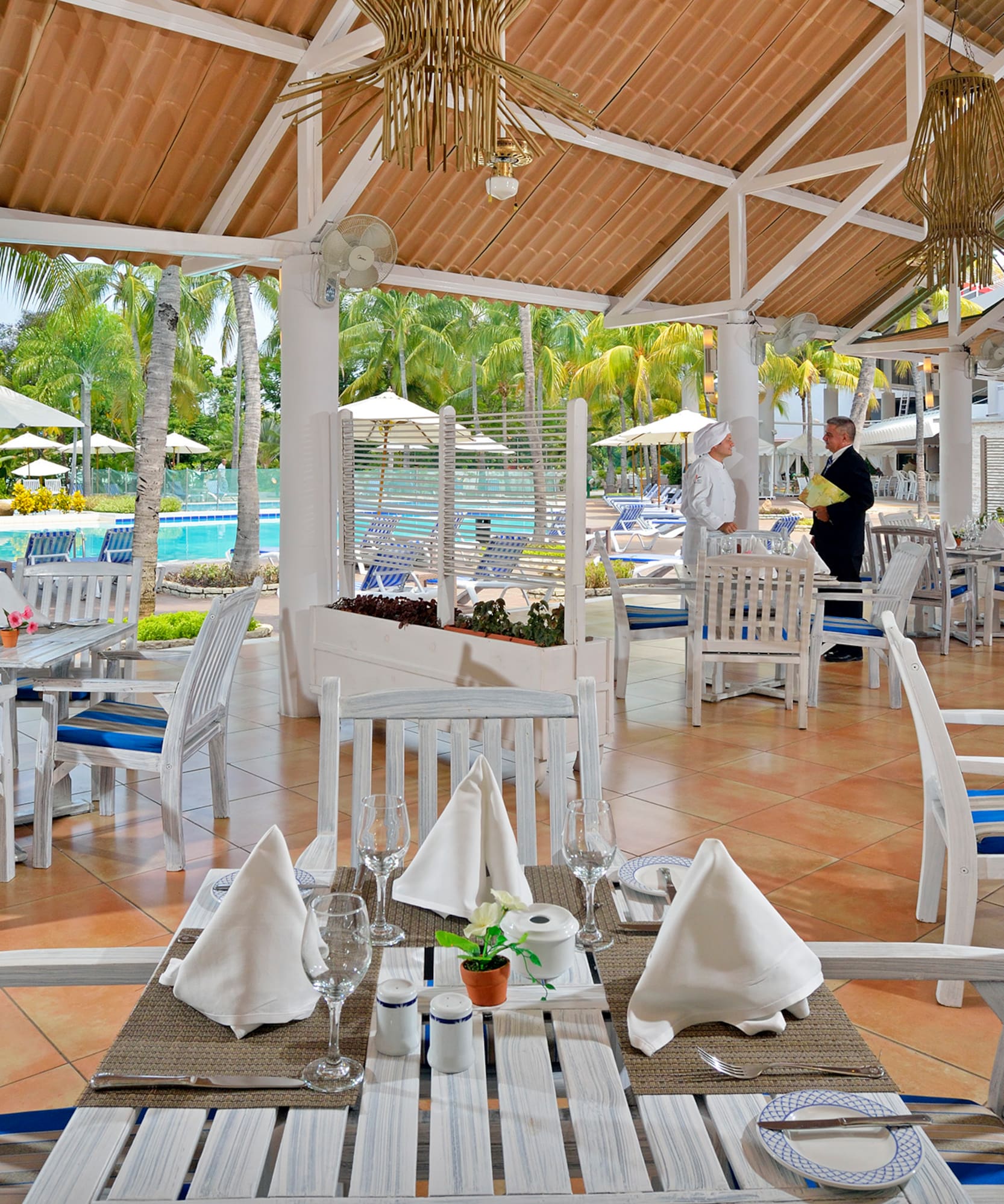 a restaurant with tables and chairs