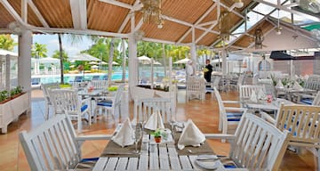 a restaurant with tables and chairs