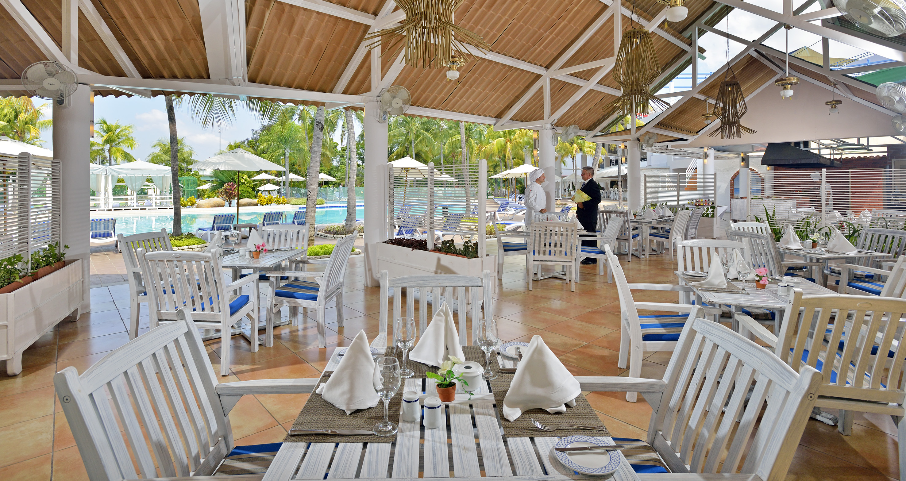 a restaurant with tables and chairs
