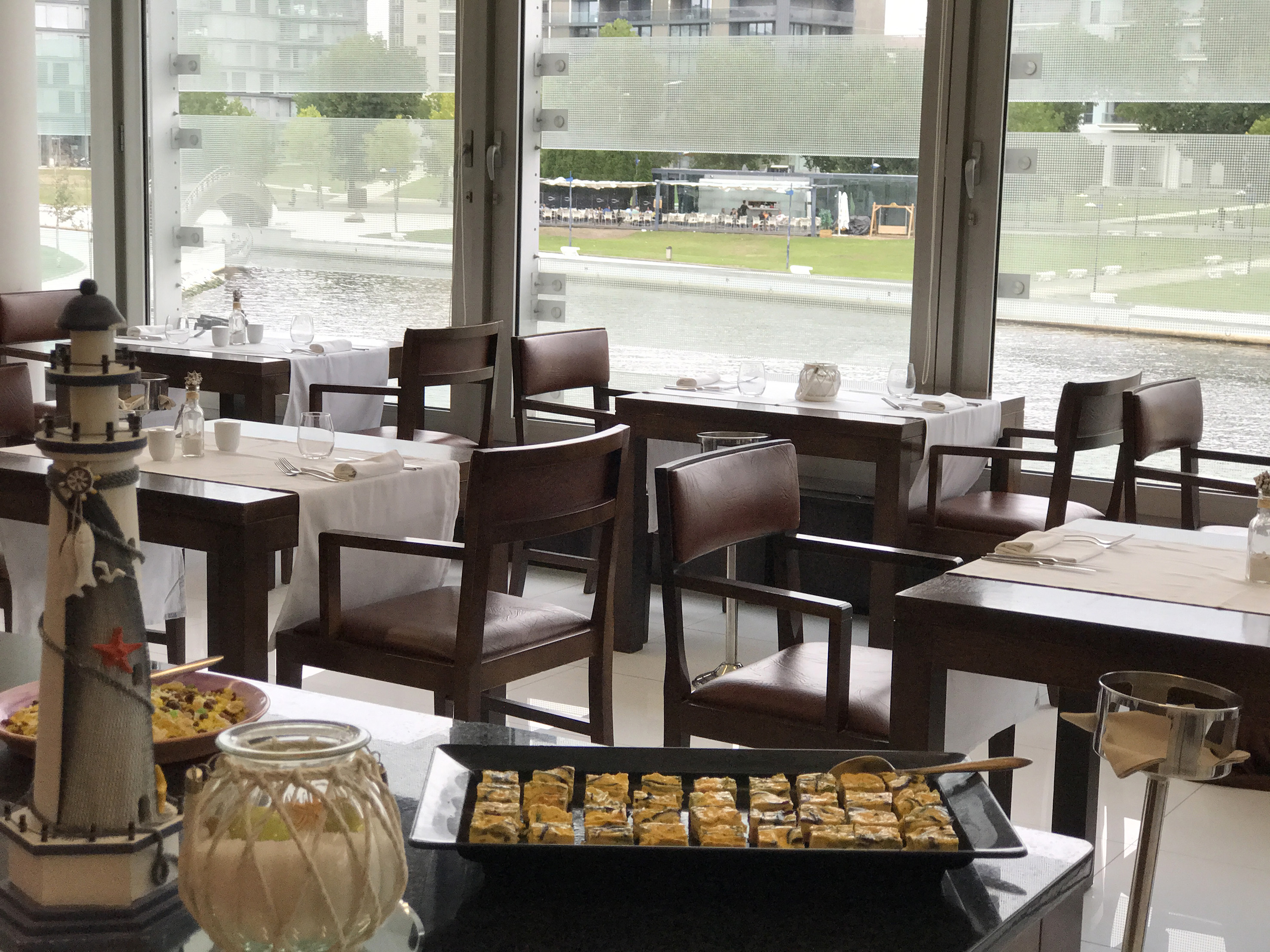 a restaurant with tables and chairs