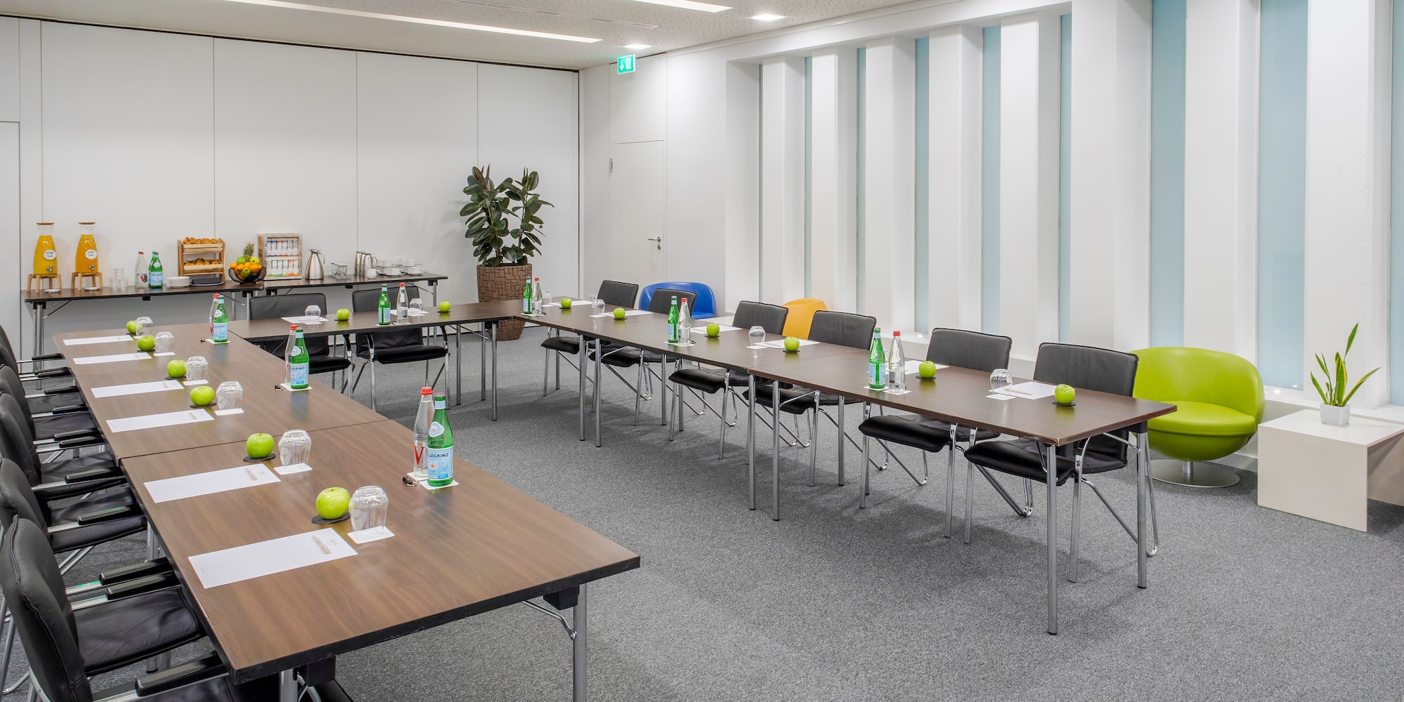 a room with tables and chairs