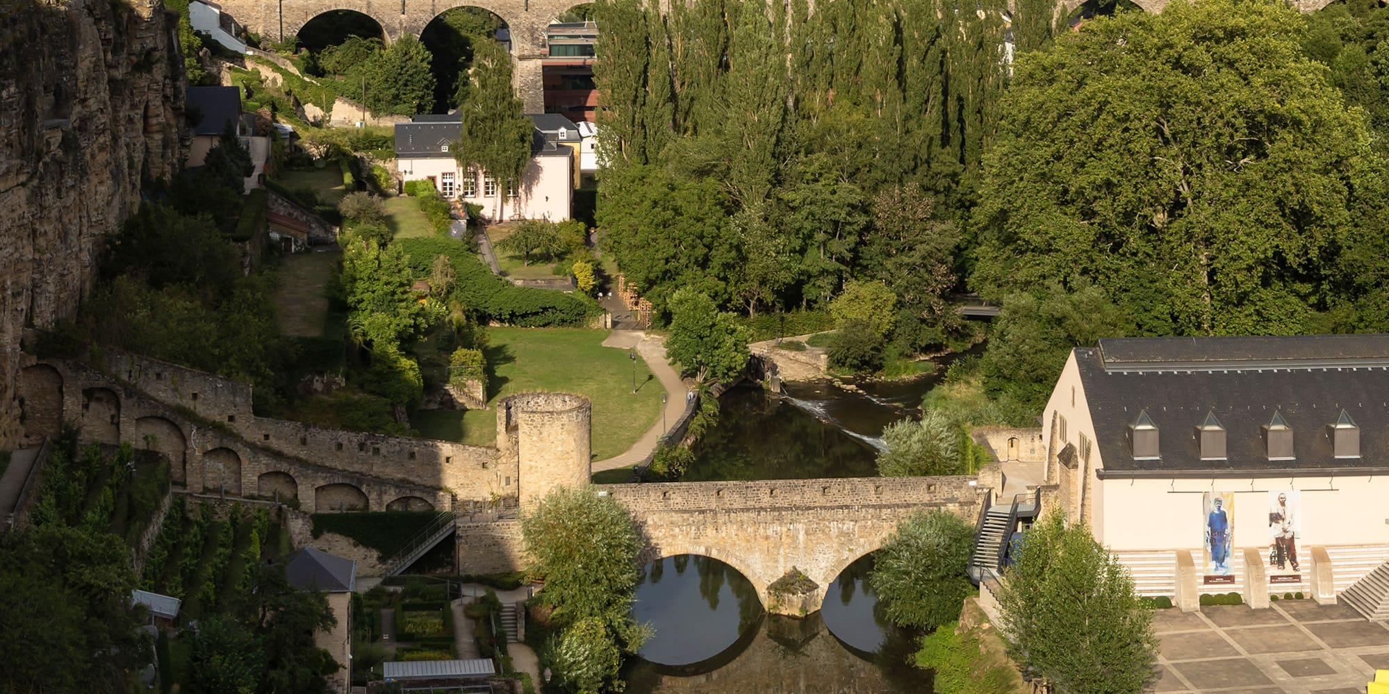 a river with a bridge over it