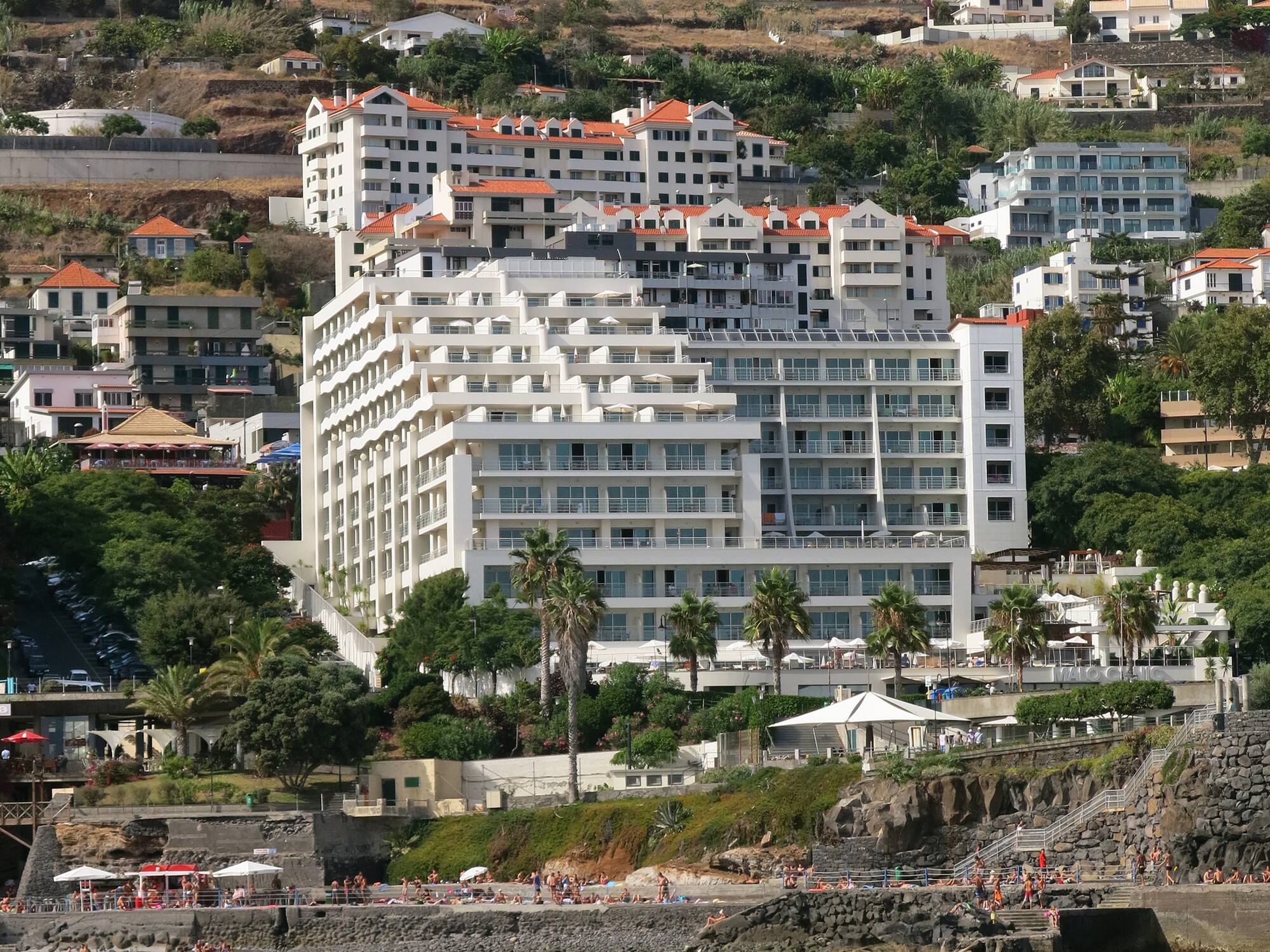 a group of buildings on a hill