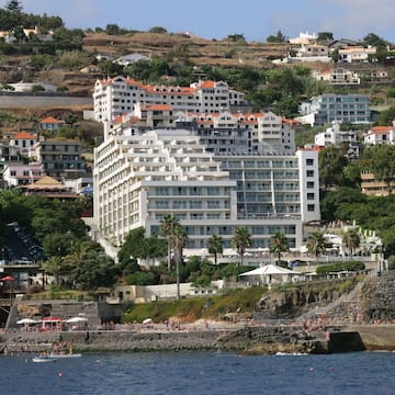 a group of buildings on a hill