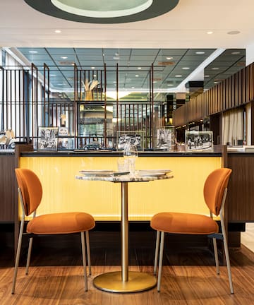 a table and chairs in a room