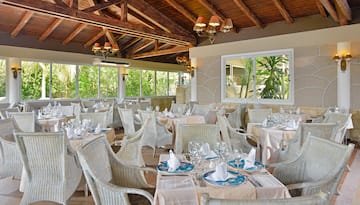 a room with tables and chairs