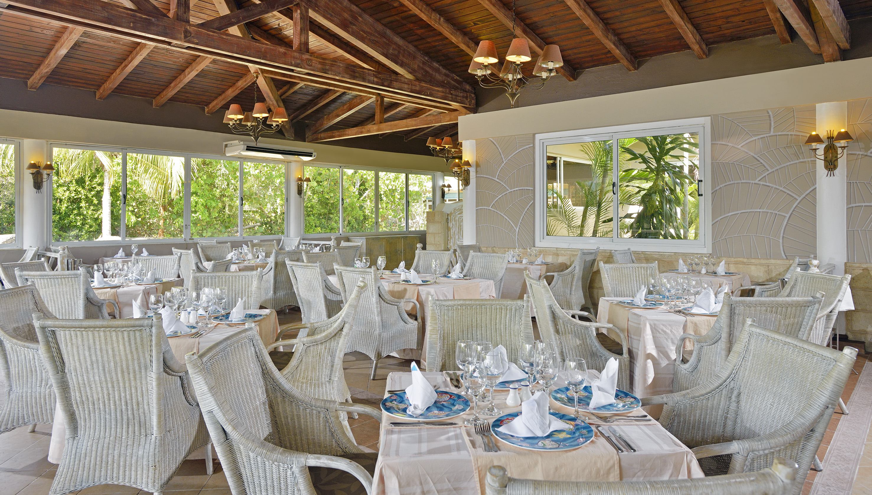 a room with tables and chairs