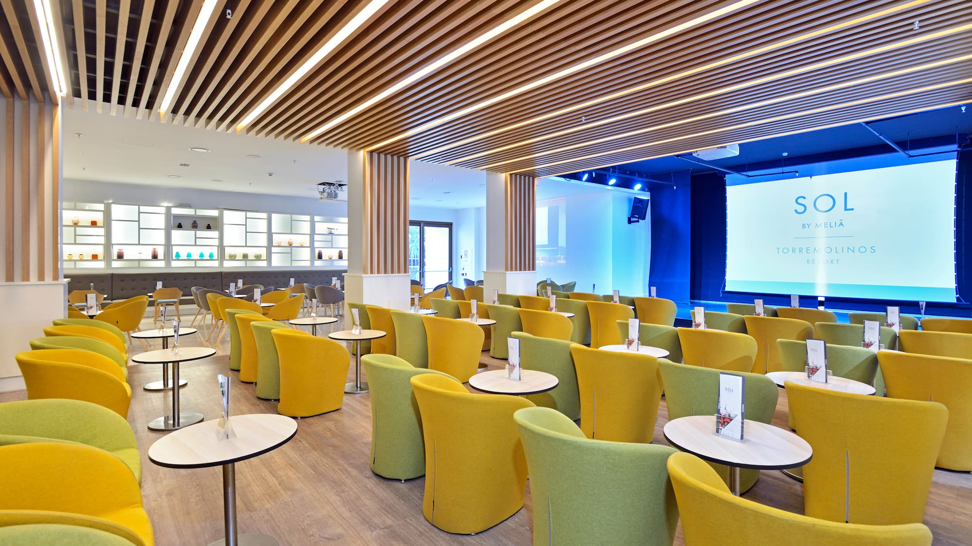 a room with tables and chairs