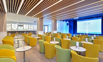 a room with tables and chairs